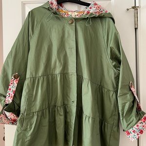 Olive and pretty print tiered and hooded rain jacket.
